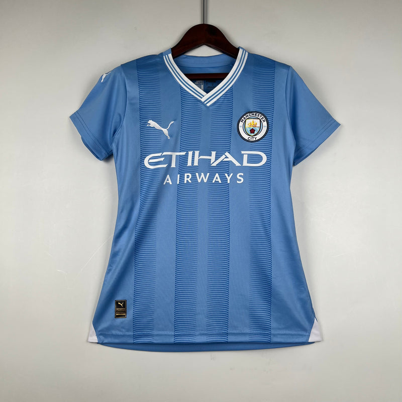 Camisola Feminina Manchester City I 23/24 - Azul e Branca